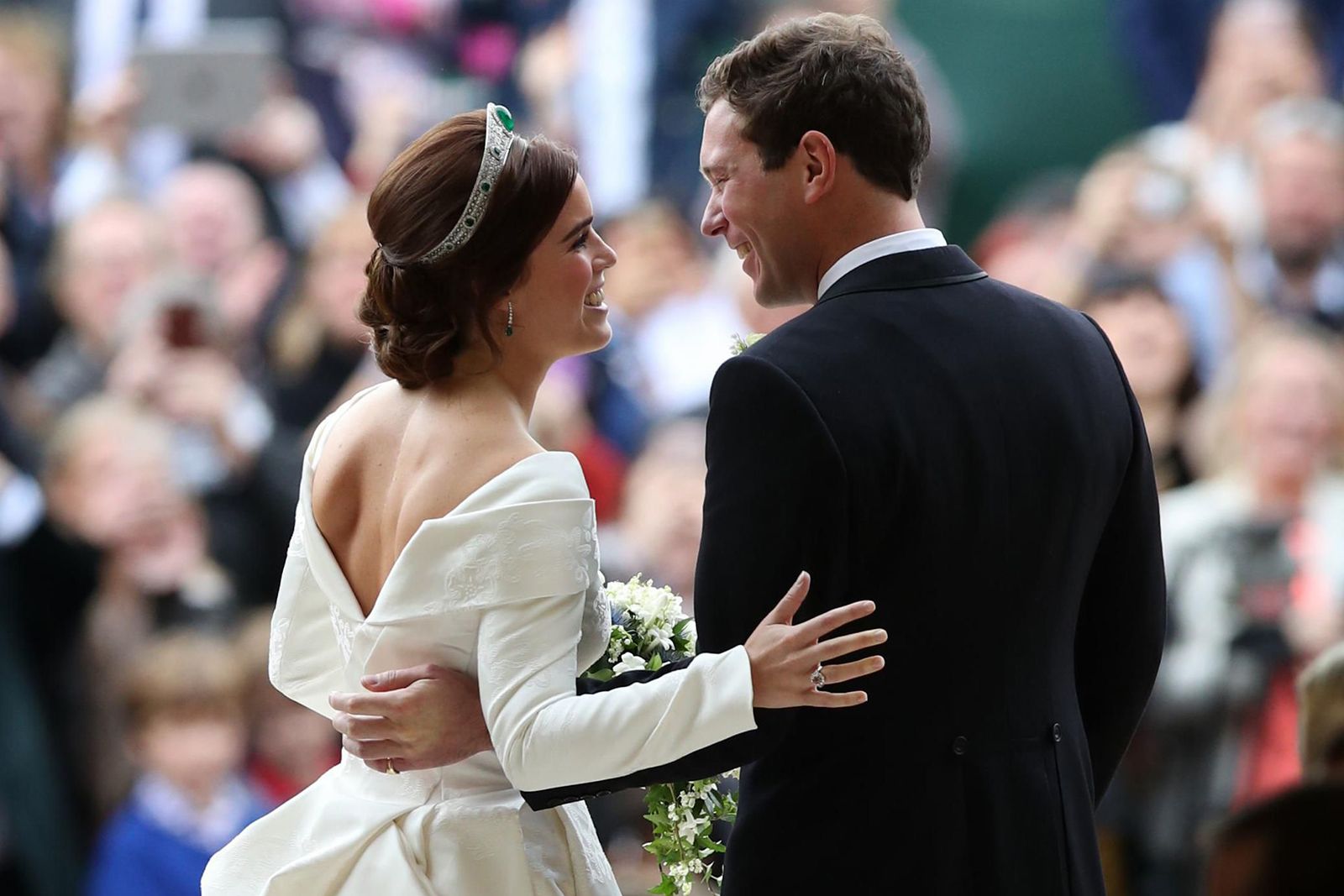 Princess Eugenie wears her Padparadscha sapphire and diamond engagement ring on her wedding day