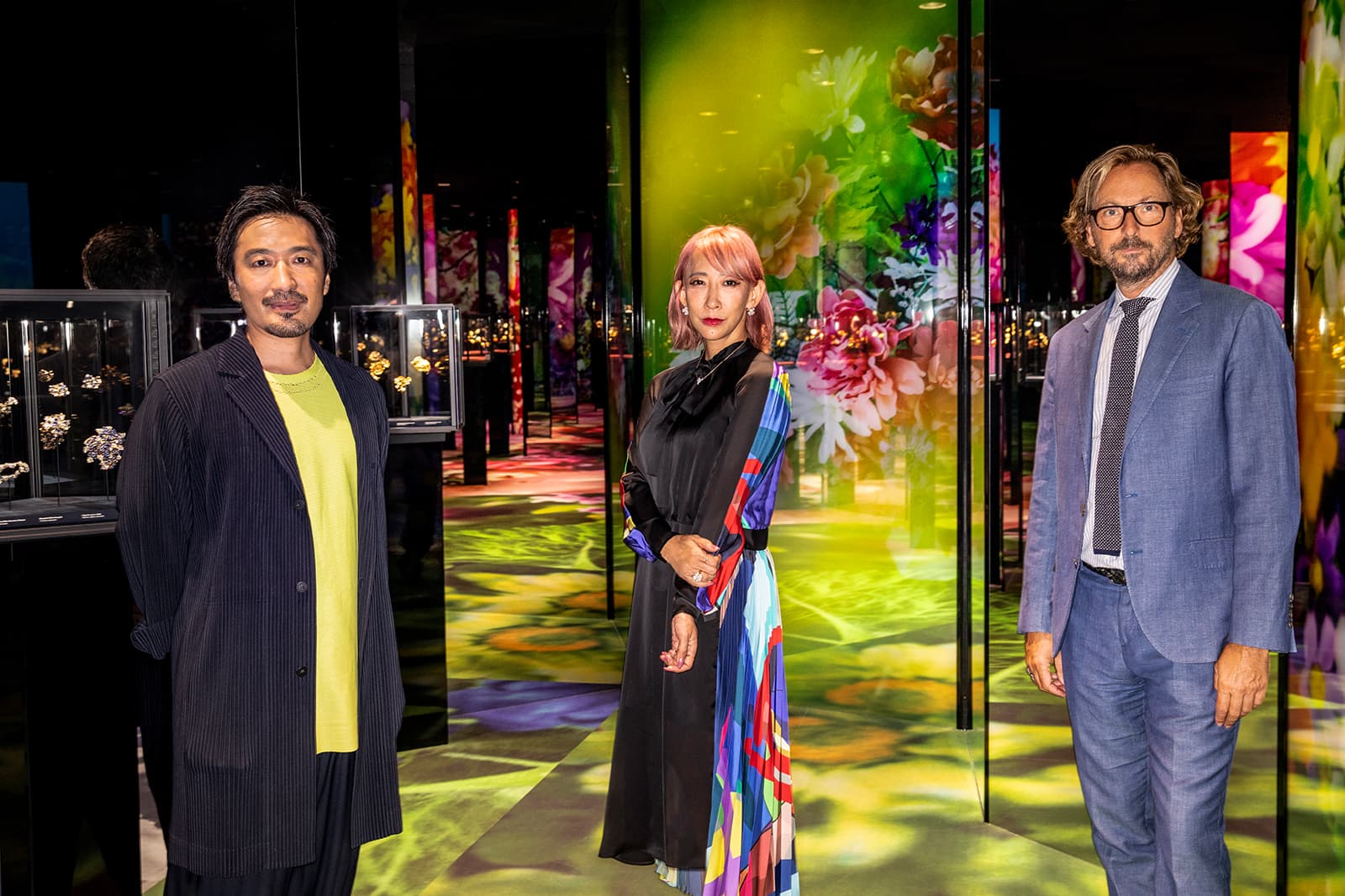 Tsuyoshi Tane, Mika Ninagawa and Nicolas Bos pose for a photograph at the Florae exhibition of Van Cleef & Arpels jewellery