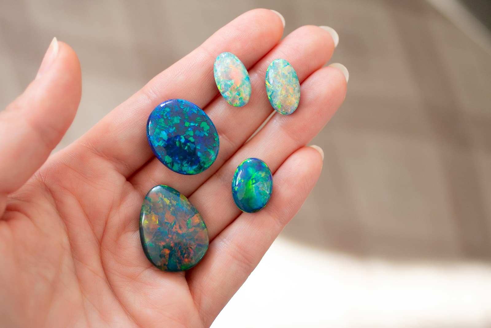 A selection of opals, including Australian black opals, courtesy of IMAGEM