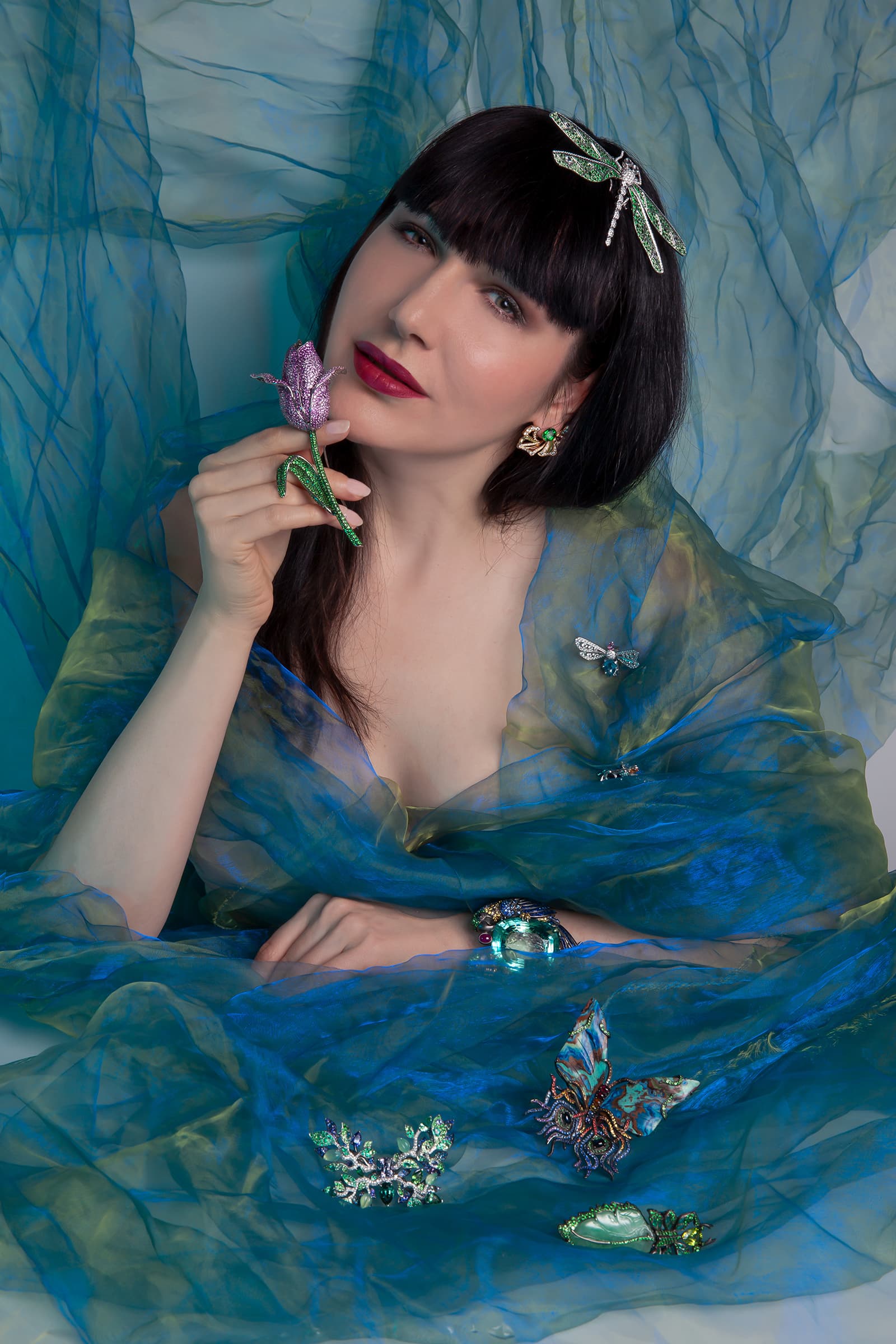 Katerina wears a selection of nature-inspired high jewels by Chaumet, Vhernier, Lorenz Baumer and Lydia Courteille