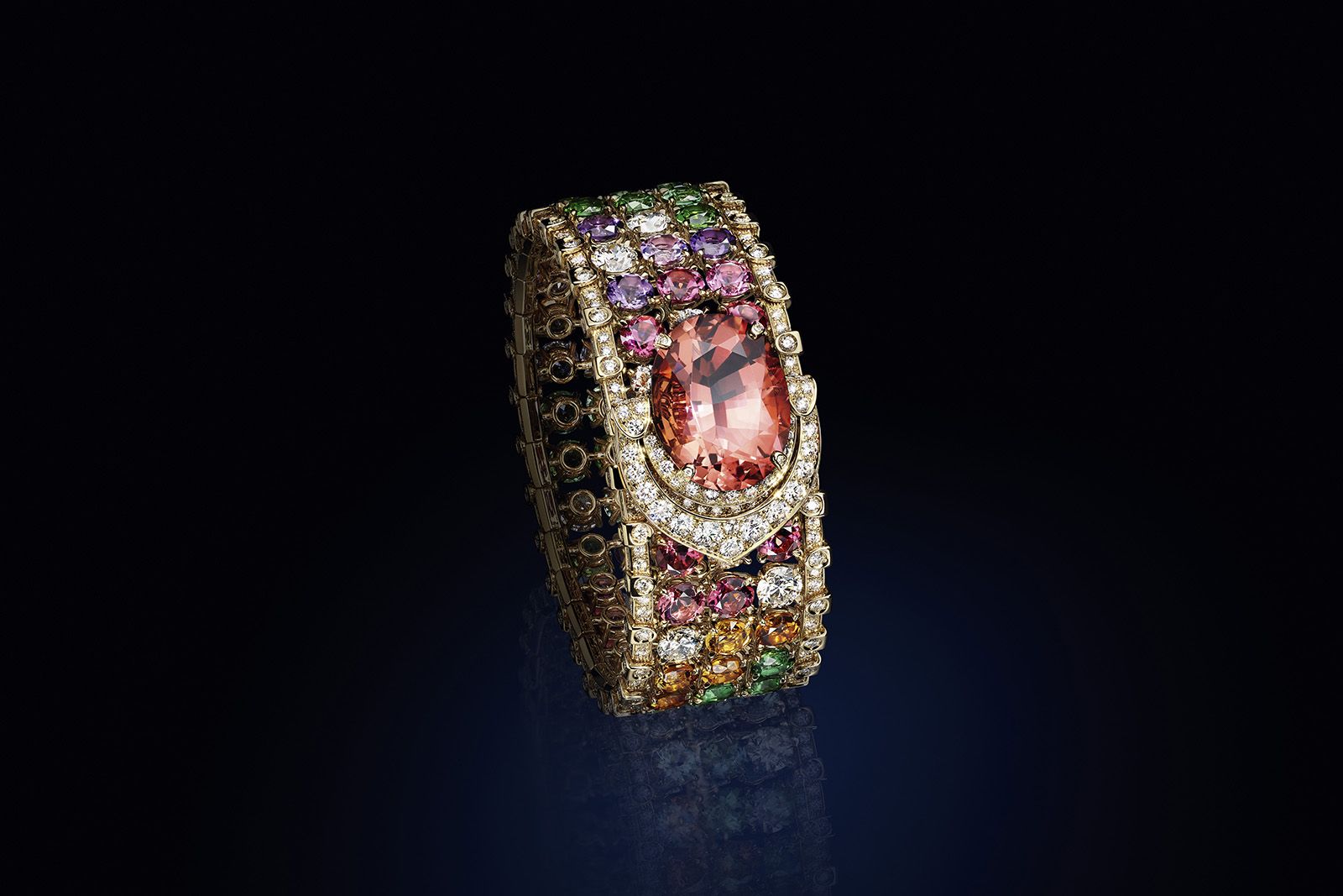 Louis Vuitton Bravery II High Jewellery Multipin bracelet in yellow gold with a 20.67 carat oval-cut pink tourmaline, an assortment of coloured stones (tourmalines, citrines, peridots, amethysts, aquamarines, iolites, garnets, tanzanites) for 39.84 carats and 472 brilliant-cut diamonds for 7.41 carats