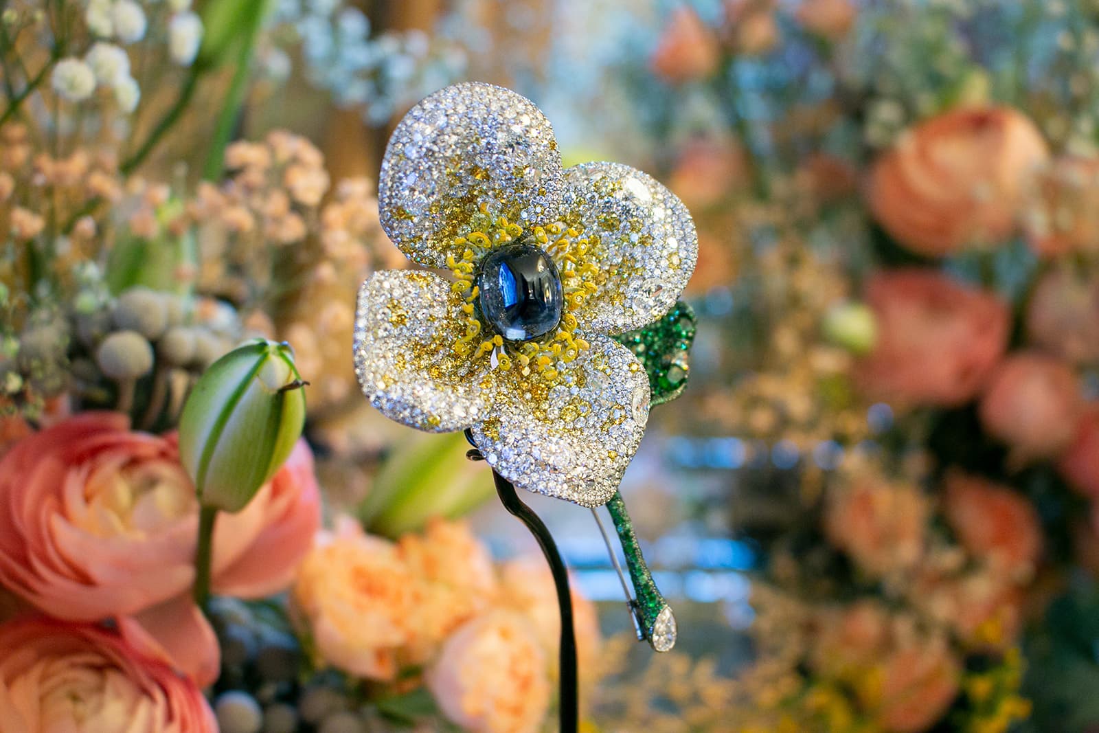 Cindy Chao Sapphire Floral brooch with a 32.11 carat untreated Burmese sapphire, colourless and yellow diamonds, demantoids and tsavorites