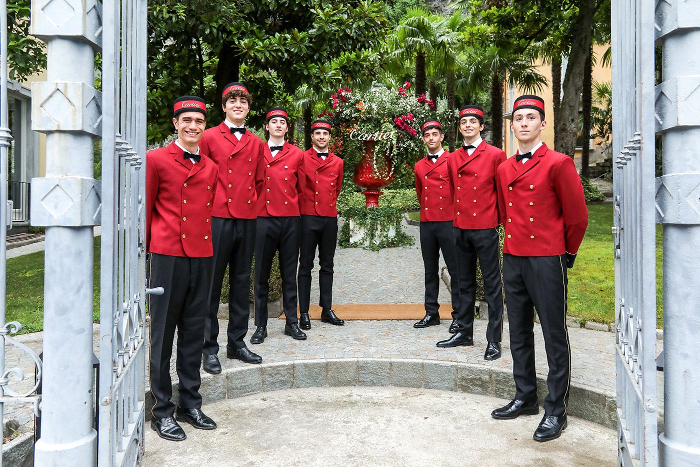Guests arriving at the Sixième Sens par Cartier High Jewellery Collection launch in Lake Como, Italy, were welcomed by waiters in the maison's recognisable red hue