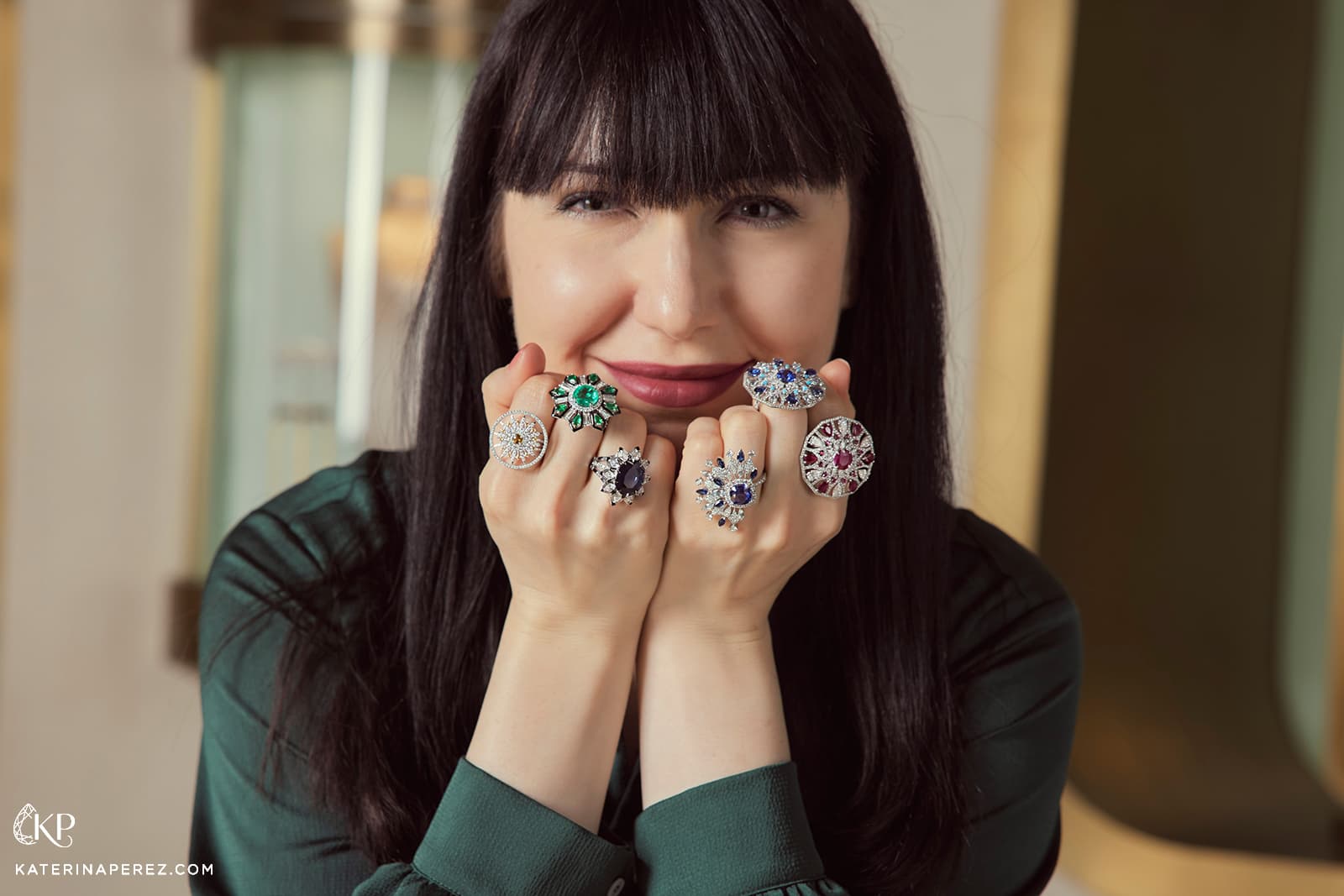 Katerina Perez wears coloured gemstone cocktail rings by Bayt Damas