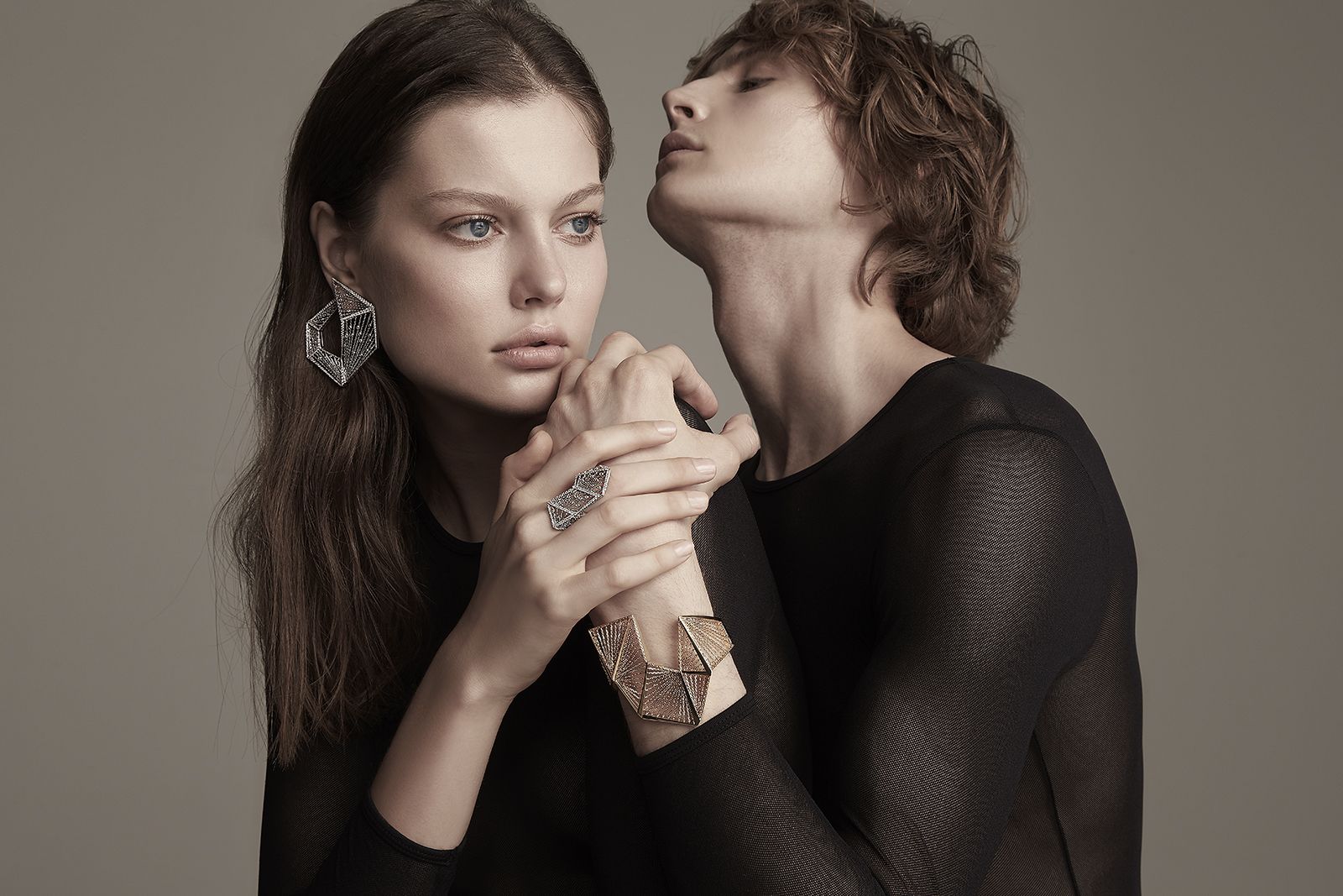 Models wear jewellery creations by Mike Joseph, including a statement cuff bracelet 