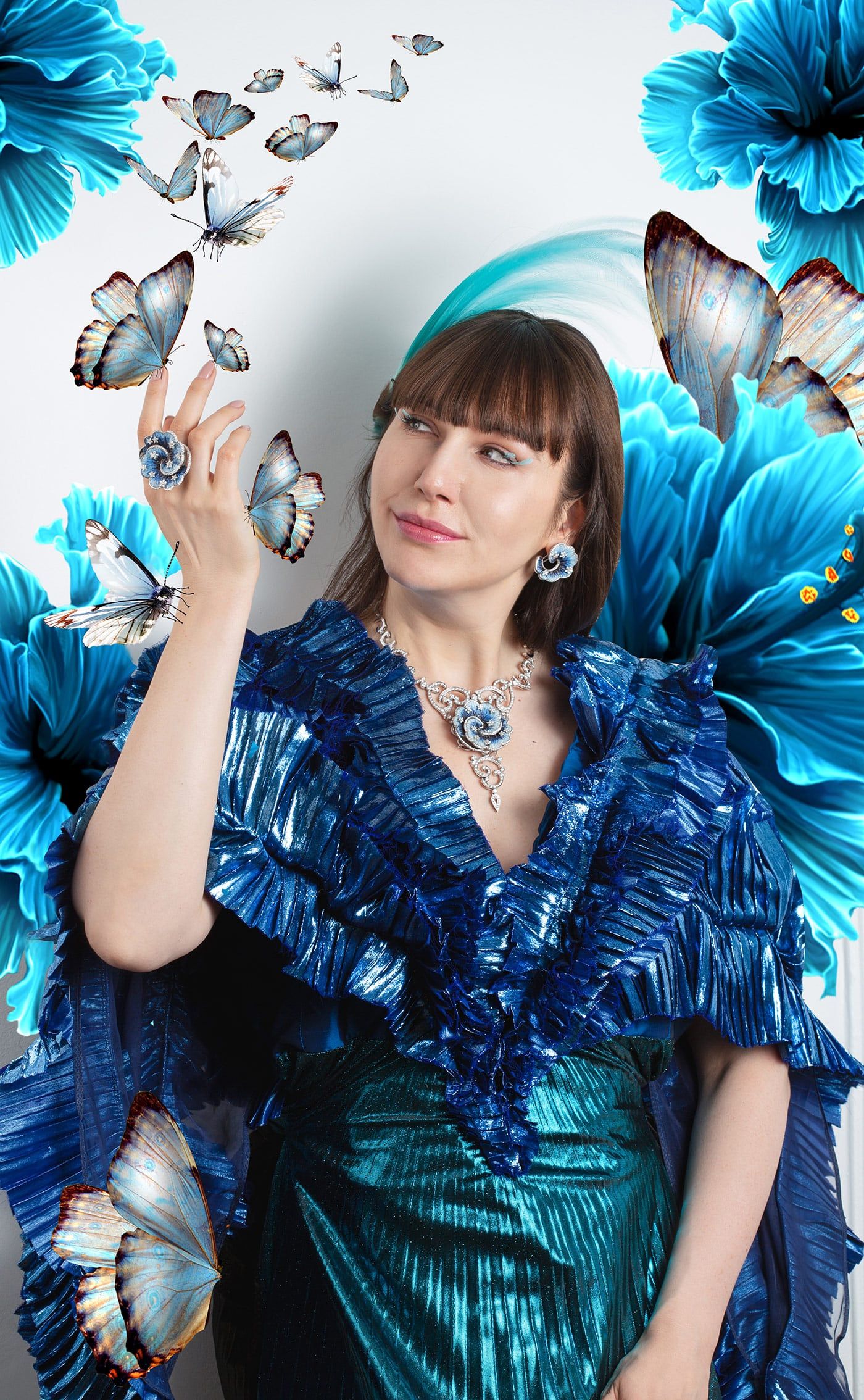 The micromosaic and diamond set is by SICIS, the dress is by Janina Juliee, the feather ornament is by Sandrine Bourg