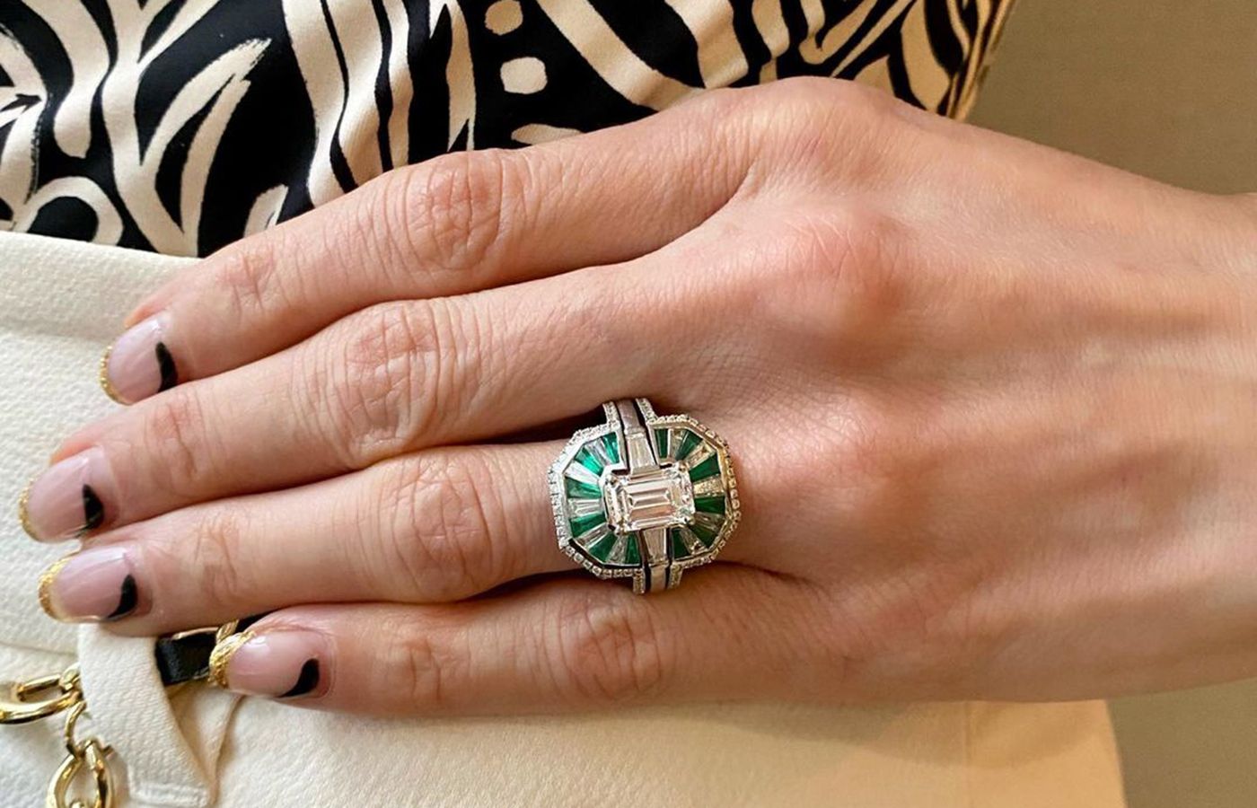 Serpentine Jewels engagement ring and ring jacket set with diamonds and emeralds