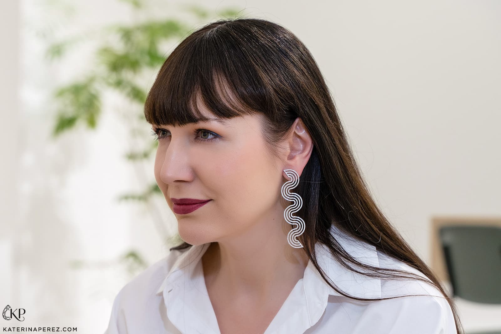 Katerina Perez wears the State Property Aldrin earrings with diamonds in 18k white gold