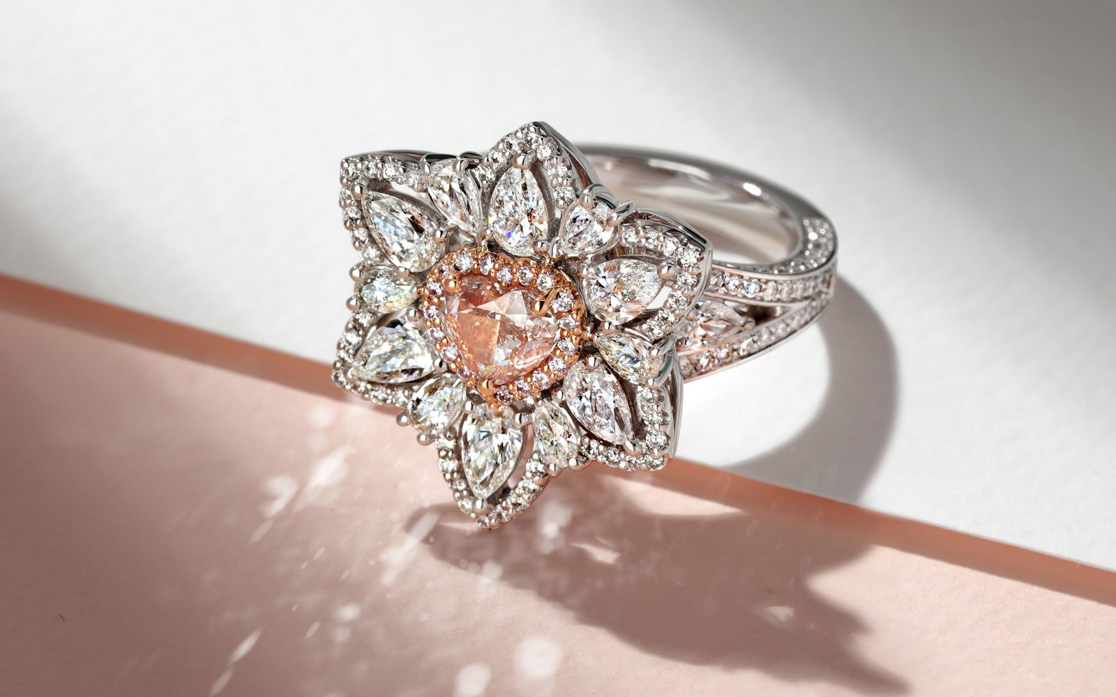 Parure Atelier High Jewellery ring featuring a Fancy Light Pinkish Brown diamond and colourless diamonds