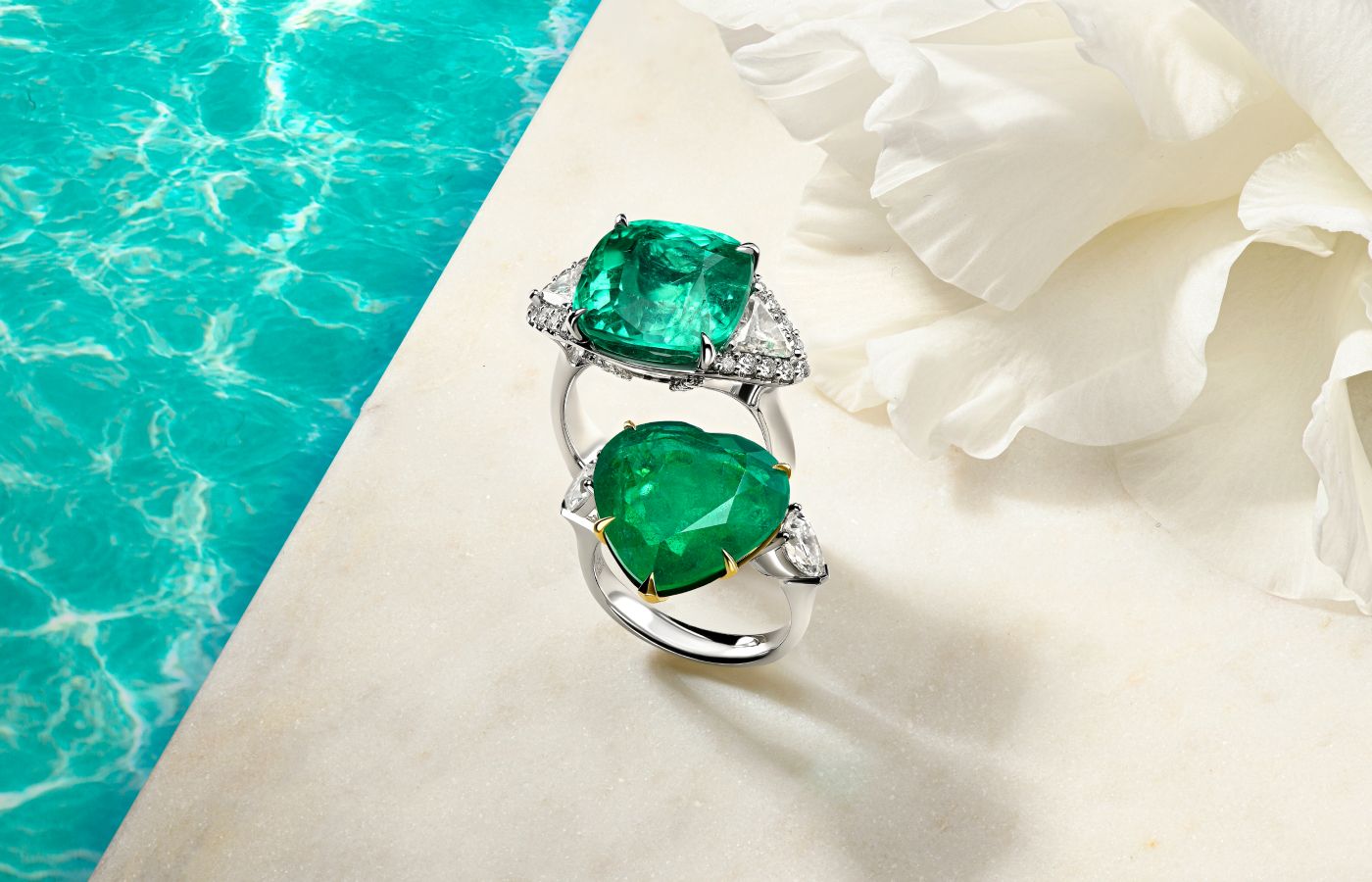 Parure Atelier High Jewellery rings featuring an 11.50-ct Colombian emerald and a 10.71-ct Zambian emerald 