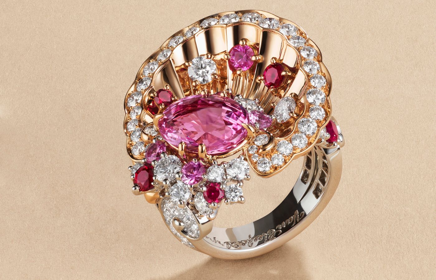 Van Cleef & Arpels Ode à l’Amour ring in rose gold, white gold, a 4.04-ct oval-cut pink sapphire, rubies, pink sapphires and diamonds from Le Grand Tour High Jewellery collection