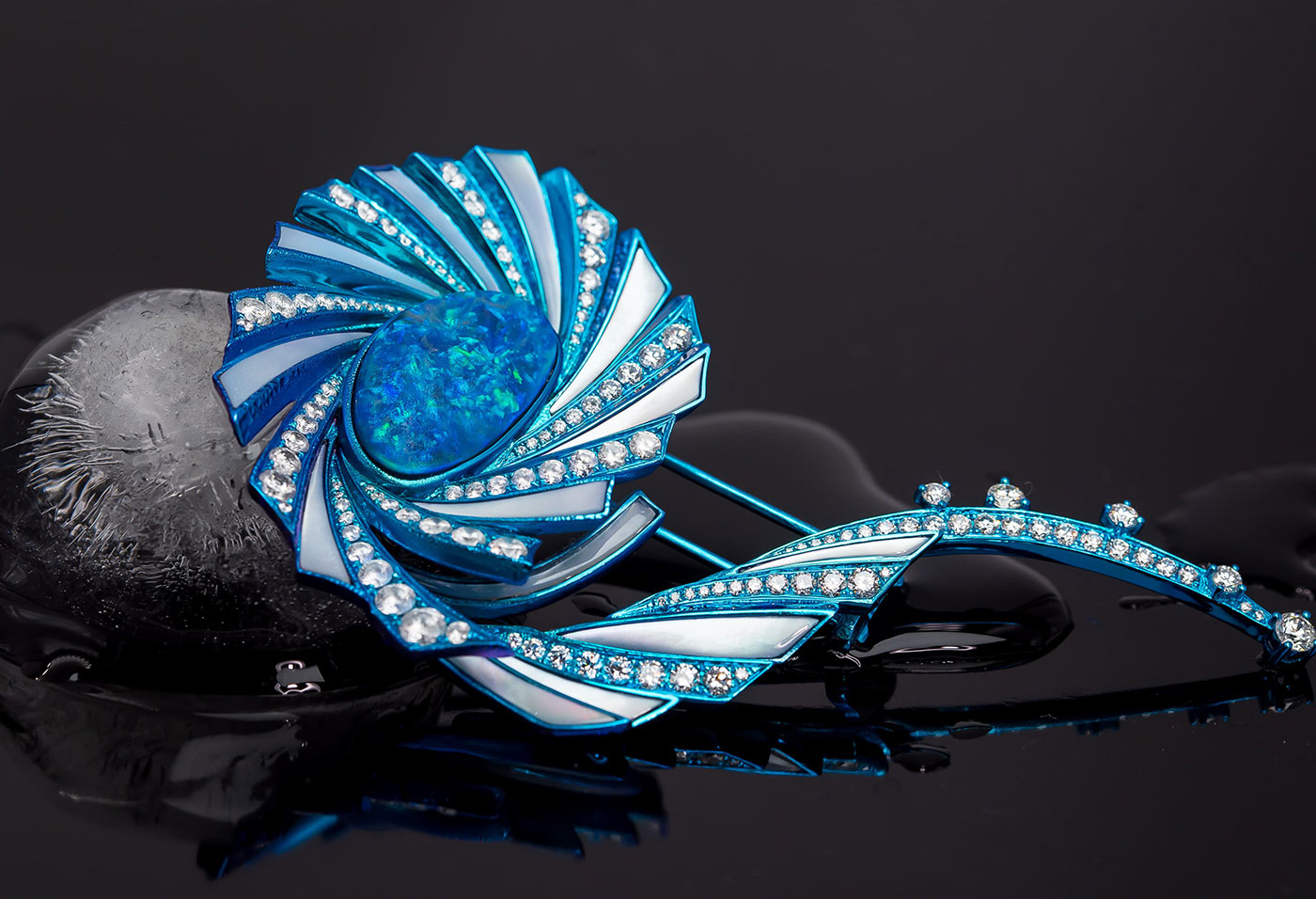 Cindy Xu Stingray Swirl brooch crafted in blue titanium with black opal, mother of pearl and diamonds