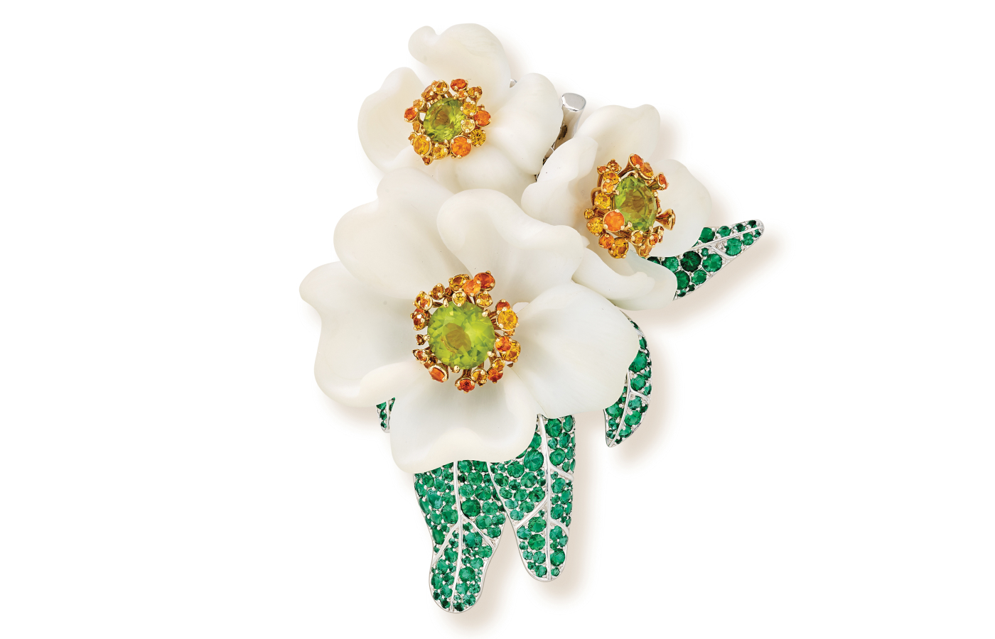 From the California Collection, this floral Carpenteria clip is a celebration of lush landscapes found across the West Coast of North America. Depicting the flower of the bush anemone or the Carpenteria californica, the Carpenteria clip (2016) features platinum, yellow gold, garnets, yellow sapphires, and peridots and uses white opal for the sculpted, delicate petals. Photo: Van Cleef & Arpels