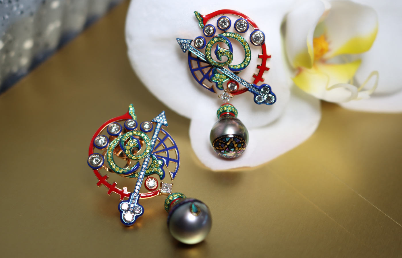 Austy Lee ‘The Wheel of Sophia’ earrings from The Gnostic Vines collection in 18K rose gold with Japanese lacquered Tahitian pearl, fancy yellow diamonds, red, blue and white enamel and white diamonds