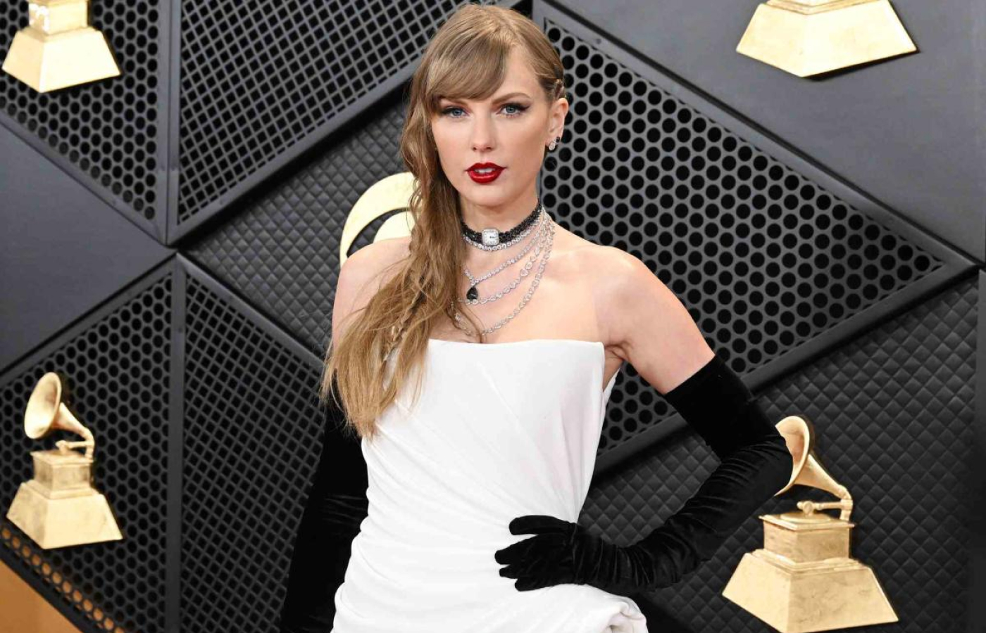 Taylor Swift at the 2024 Grammy Awards wearing a Lorraine Schwartz wrist watch as a choker necklace