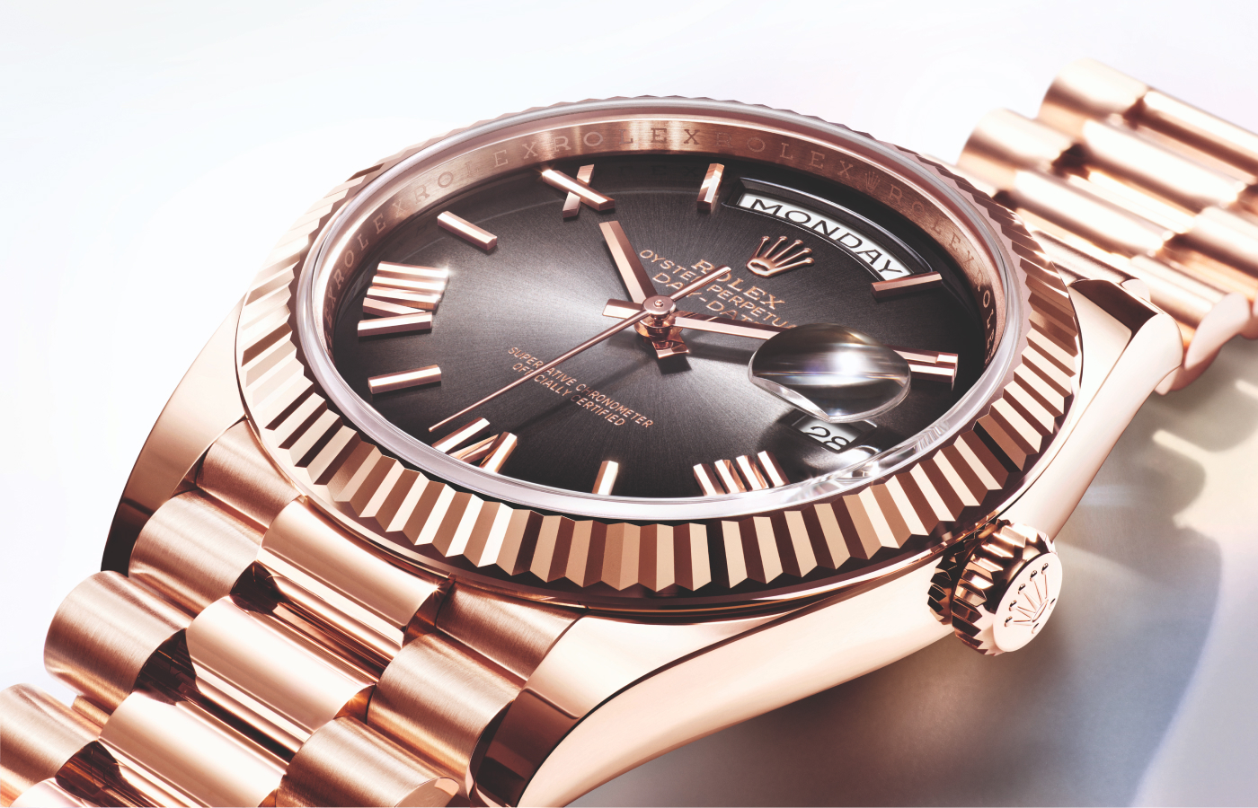 Rolex Oyster Perpetual Day-Date in pink gold, Everose gold with a black slate ombré, gloss, sunray finish dial