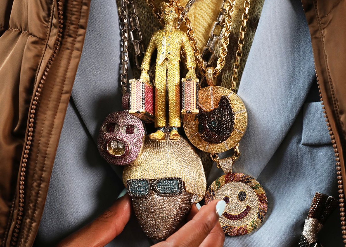 A suite of gem-encrusted necklaces worn by Tyler, The Creator, part of Ice Cold: An Exhibition of Hip-Hop Jewelry at the American Museum of Natural History. Credit Cam Hicks 