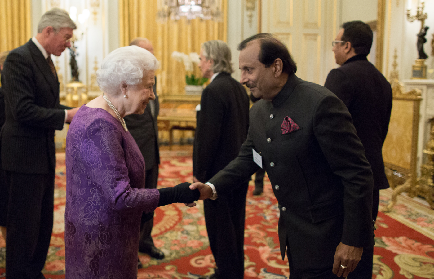 Amrapali co-founder Rajiv Arora with the late Queen Elizabeth II