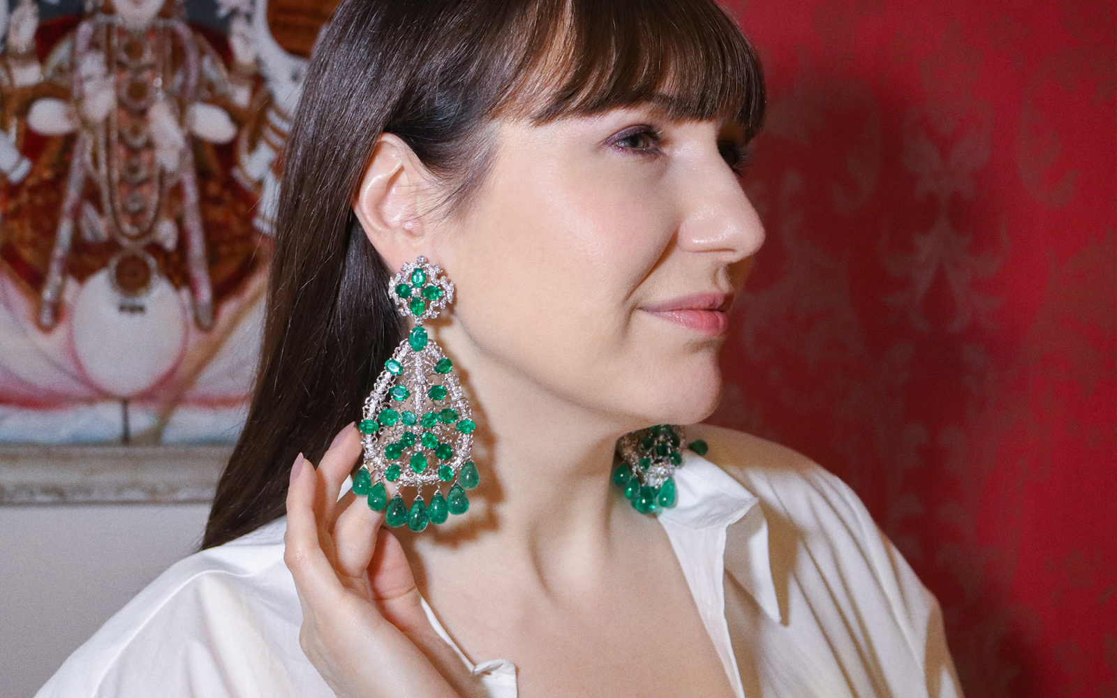 Katerina Perez wearing Amrapali earrings in gold set with over 177-cts of emeralds and diamonds 
