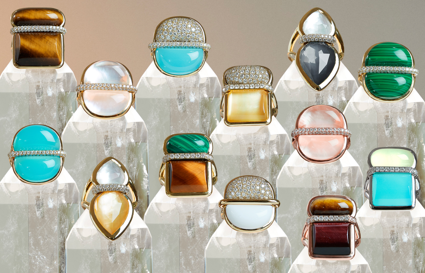 Selection of Marceline Paris rings from the Amrita collection in gold, rose gold, white ceramic, blue chalcedony, tiger's eye, malachite, white mother-of-pearl, bull's eye, phenite, yellow mother-of-pearl, citrine, white quartz, pink opal and diamond