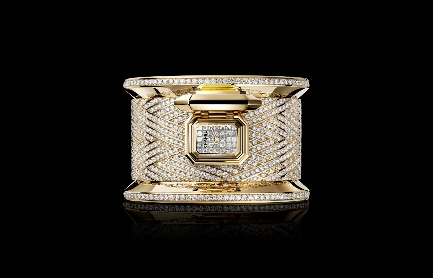 Chanel Bobbin Cuff Couture watch in gold and diamond set with a 17.51-ct yellow emerald-cut sapphire from the Couture O'Clock capsule collection