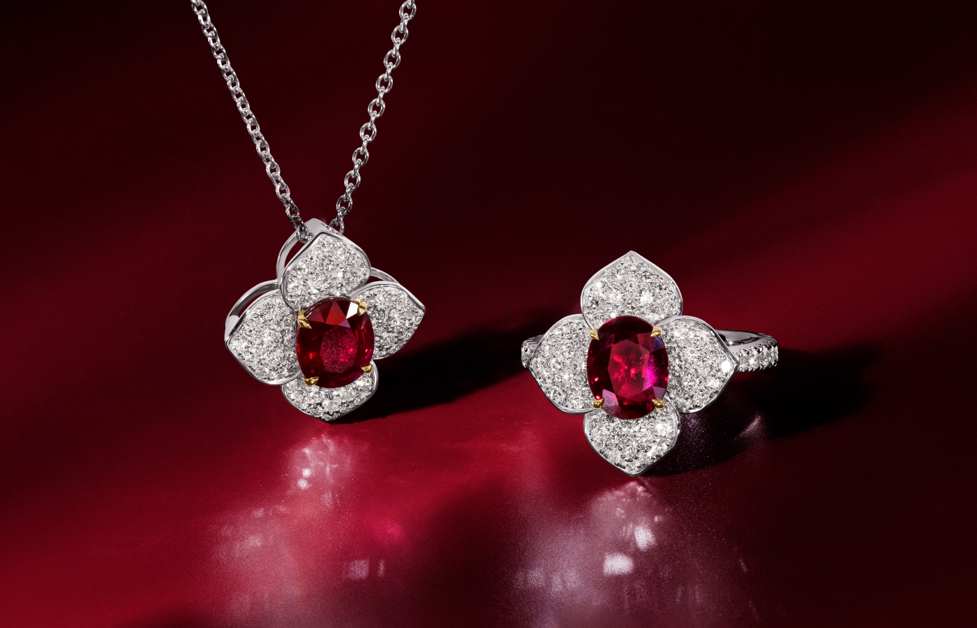 Le Vian Couture® pendant with a 2.2 carat Passion Ruby™ and Vanilla Diamonds® set in platinum with 18K Honey Gold™ alongside a matching ring with a 2.2 carat Passion Ruby™ and one carat of Vanilla Diamonds®