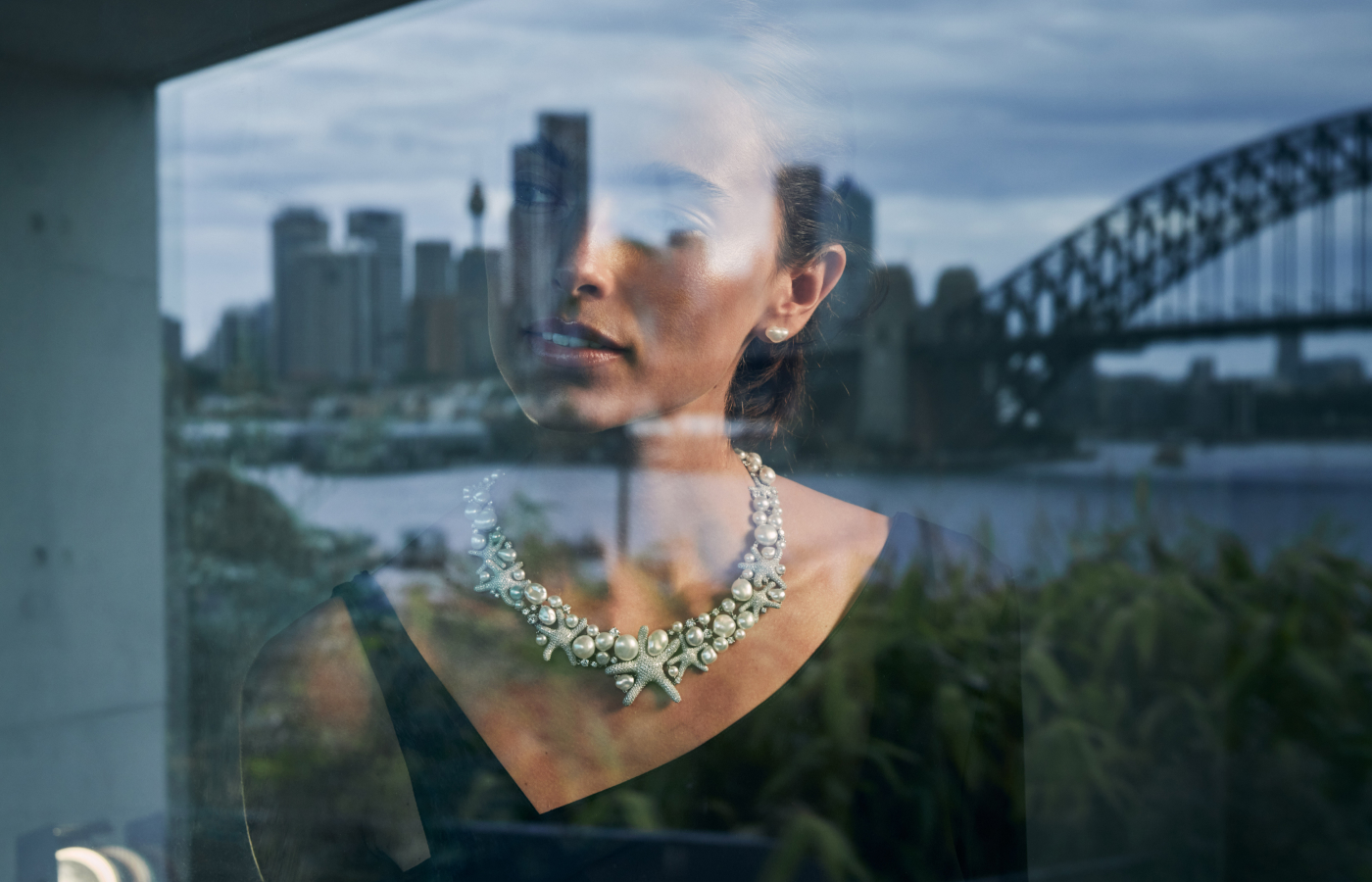 Model wearing Paspaley Rockpool Starfish necklace in platinum, Keshi Baroque Australian South Sea Pearl and diamond