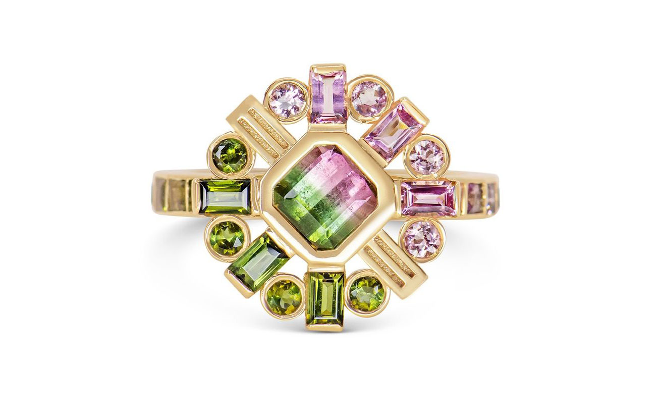 Watermelon Sugar Burst ring by London's Genevieve Schwartz in 14k yellow gold, with round and baguette cut tourmalines surrounding a stunning emerald cut watermelon tourmaline