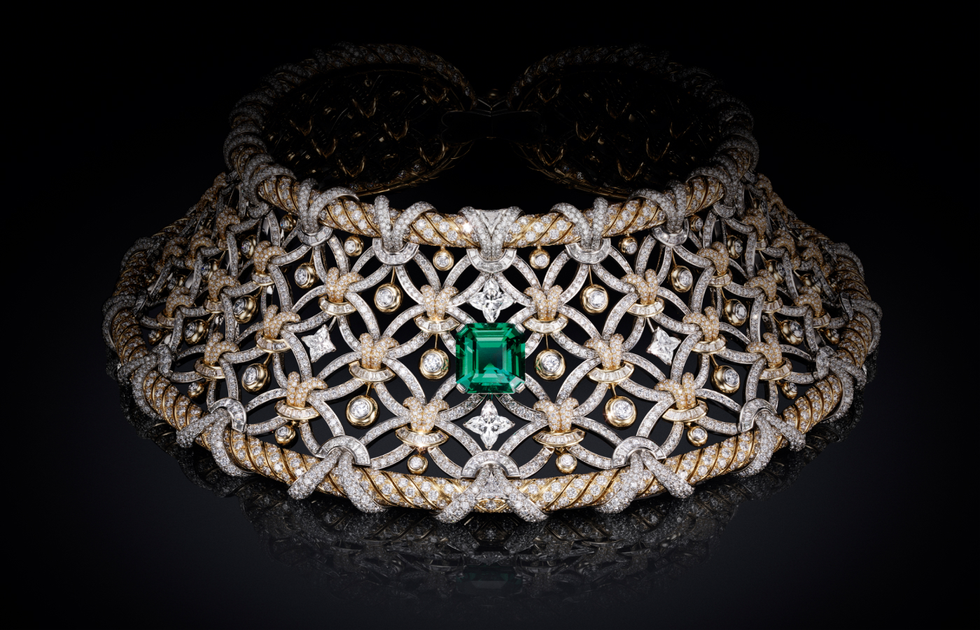 Louis Vuitton Seduction necklace with a 12.92-carat octogonal step-cut emerald, two 2.05 - carat LV Monogram star cut diamonds, two 1.03 - carat LV Monogram star cut diamonds and diamonds in platinum and gold from the Awakened Hands, Awakened Minds collection