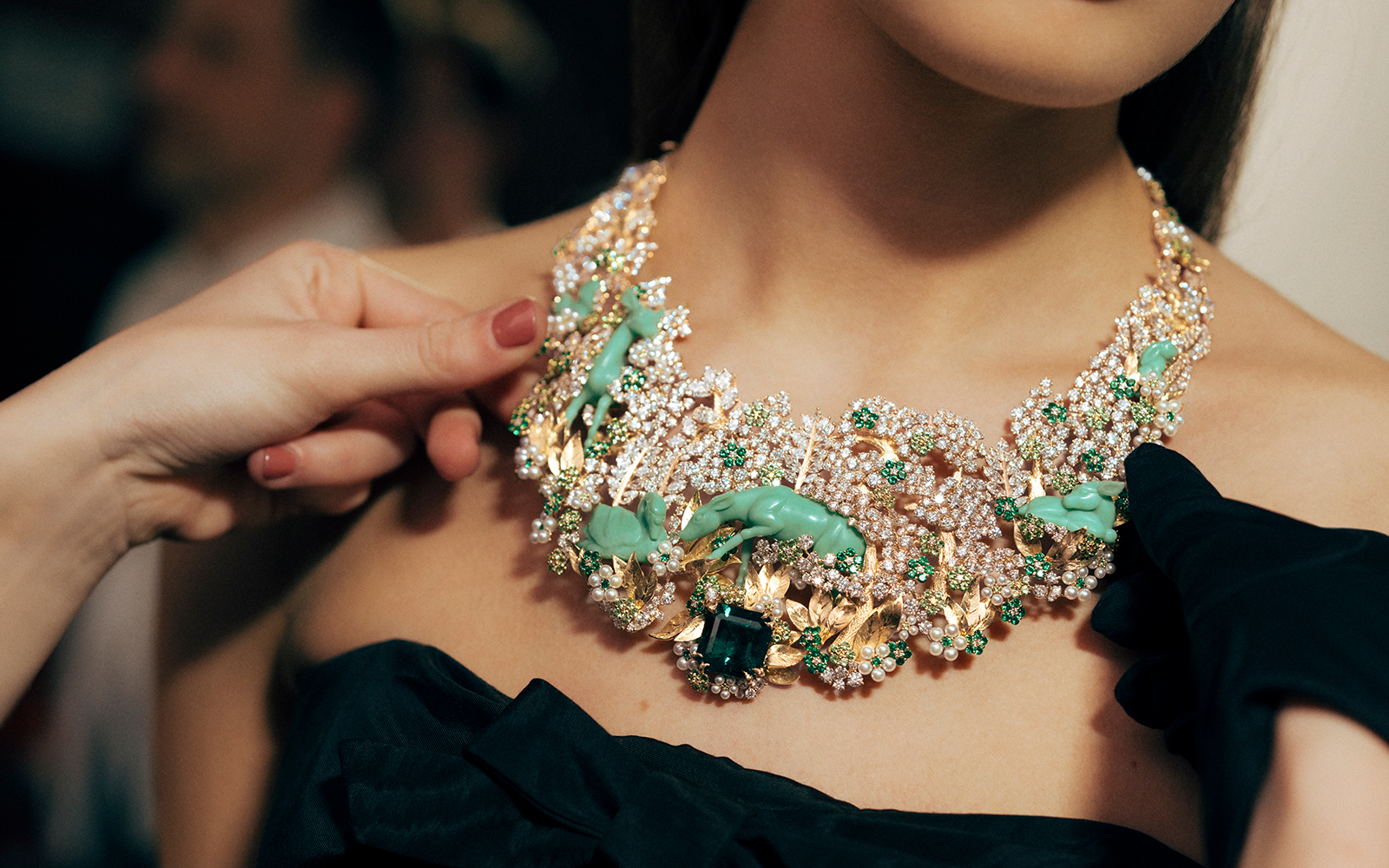 A model wears the Diorama Forêt Enchantée Necklace from the Diorama & Diorigami High Jewellery Collection. Image Credit: Pierre Mouton