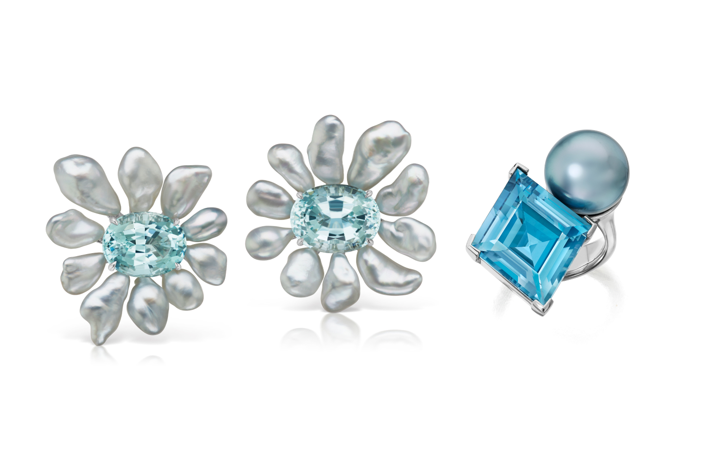 Assael Flower earrings with aquamarine and Keshi pearl in 18k white gold, and an Assael ring with aquamarine and a blue Tahitian pearl in 18k white gold