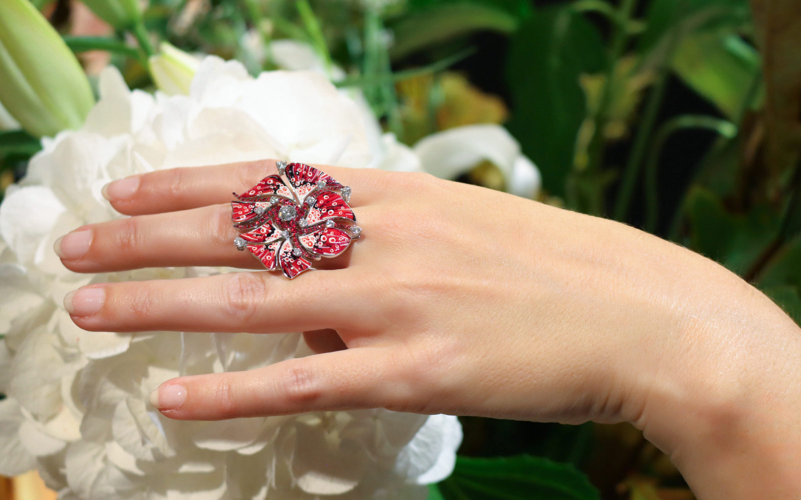 Sicis La Vie En Rose ring with articulated micromosaic petals surrounding a 1.43-carat trilliant-cut diamond 