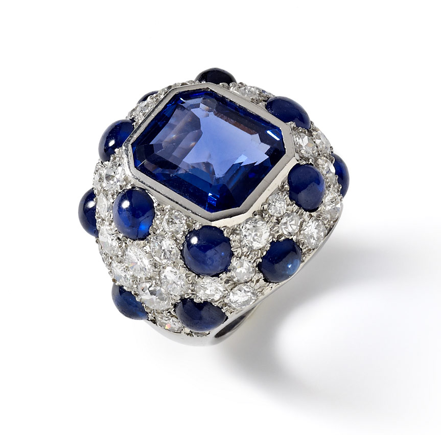 Striking Modele a pois bombe ring mounted in platinum set with sapphires and diamonds by Suzanne Belperron, Paris, C1945