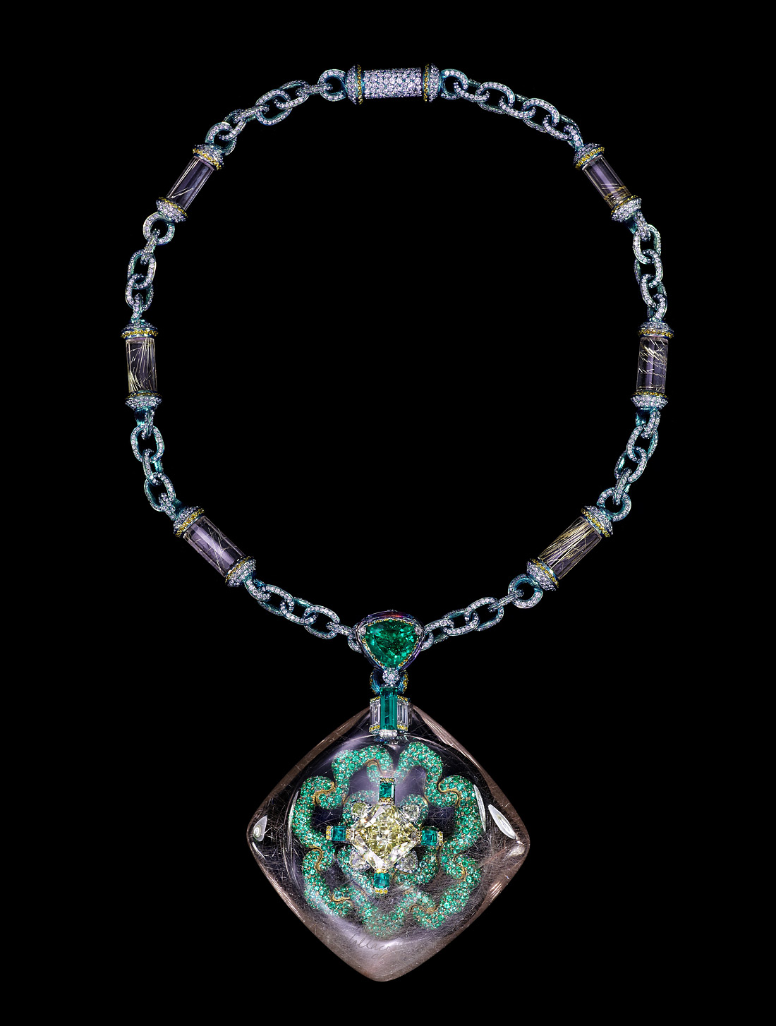 Wallace Chan Secret Abyss necklace with a yellow diamond of 10.05 cts set in a rutilated quartz shell of 211.74ct and complemented with emeralds, fancy colored diamonds, amethysts and rutilated quartz
