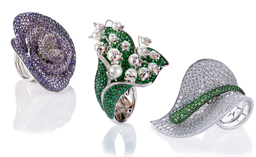From left to right: Rose ring in white gold with sapphires; Mughetto Ring with pearls, trsavorites and diamonds set in white gold; Anturium ring with tsavorites and diamonds set in white gold