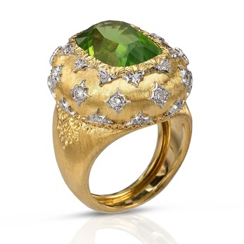 Ring with peridot and diamonds in yellow and white gold