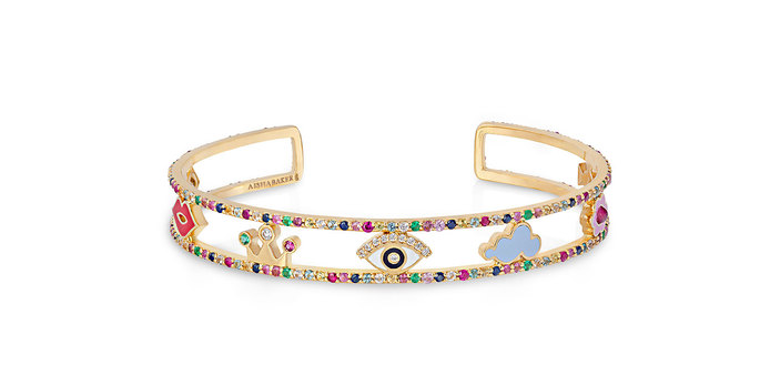 A Charmed Life bangle with enamel, pink, blue and yellow sapphires, aquamarines, emeralds, tourmalines and diamonds 