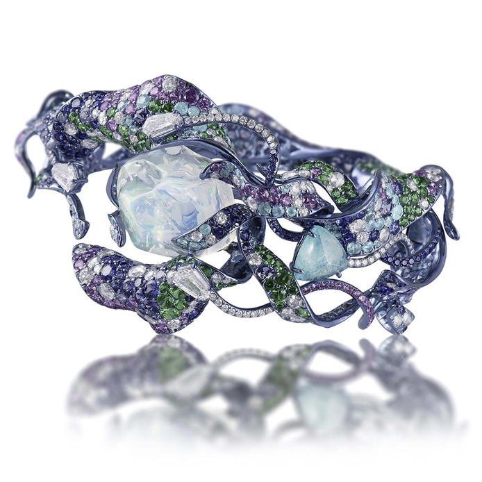 Vruta cuff bracelet made in titanium with a water opal, fancy colour sapphires, tsavorites and diamonds