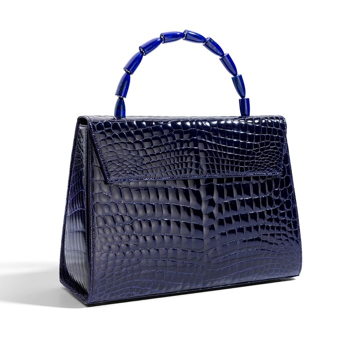 Calla handbag in purple crocodile with handle in lapis and 18K white gold