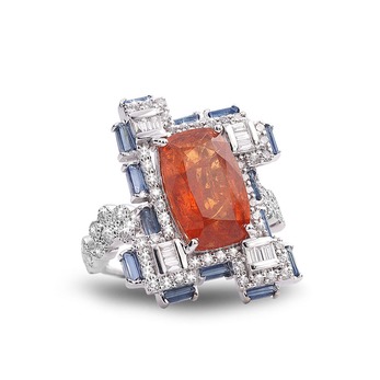 Trinity ring with mandarin garnet, sapphires and diamonds in white gold
