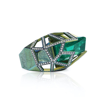 Orion ring with an emerald gemstone caged in titanium and diamonds 