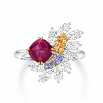 Dancing Flames ring with a cabochon ruby and diamonds