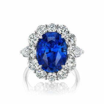 Sapphire and diamond cluster ring with a 9.06ct oval-shaped blue sapphire 