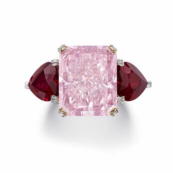 Rose of Caroline ring with a 10.88 carat fancy intense pink diamond and ruby side stones 