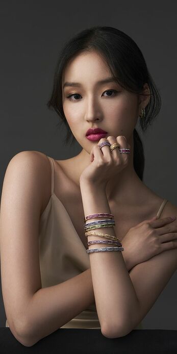 Petal bangles set with coloured gemstones and diamonds in 18k white, yellow and rose gold 