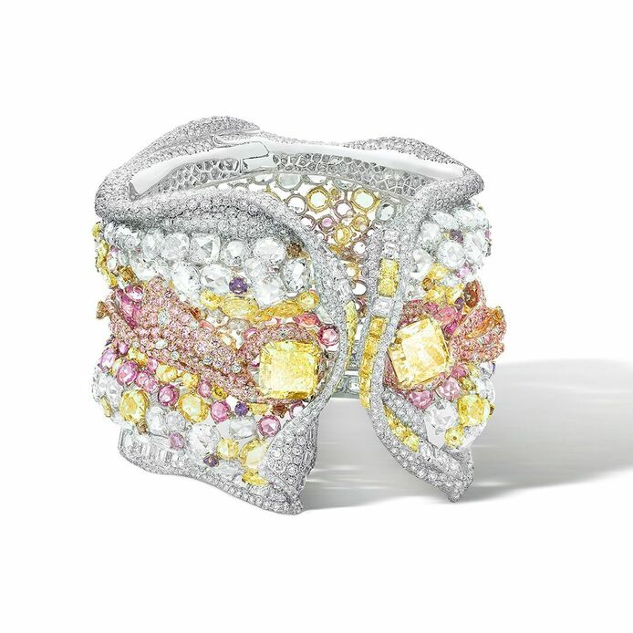 Gentlewoman Ribbon High Jewellery Cuff from the 2022 Black Label Masterpiece VII High Jewellery collection in white, yellow and rose gold, white diamond, yellow diamond, brownish yellow diamond, pink diamond, sapphire, rhodolite and purple garnet