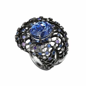 Cocktail ring in black gold and precious coloured gemstones