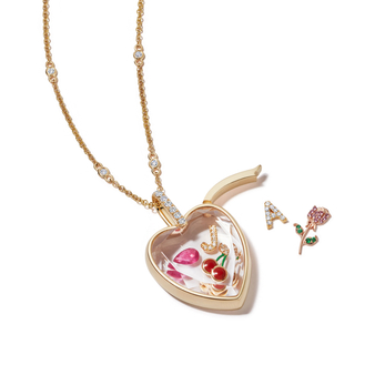 Heart necklace in gold with a selection of charms
