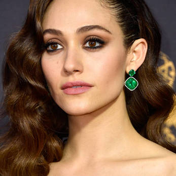 Emmy Rossum wearing Lorraine Schwartz earrings with Colombian emeralds