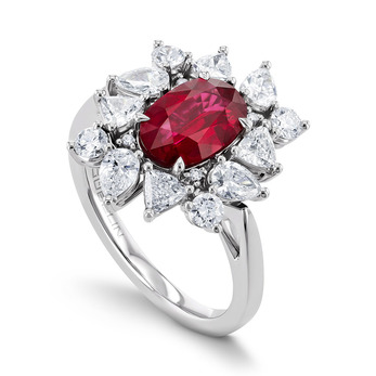 Gübelin ring from the Mystical Garden collection with an oval ruby and diamonds